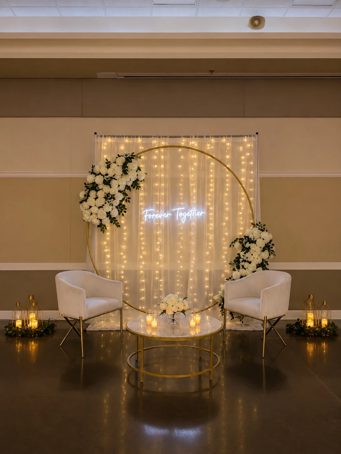 Elegant white floral Forever Together event scene with gold circular frame, lights and lounge seating